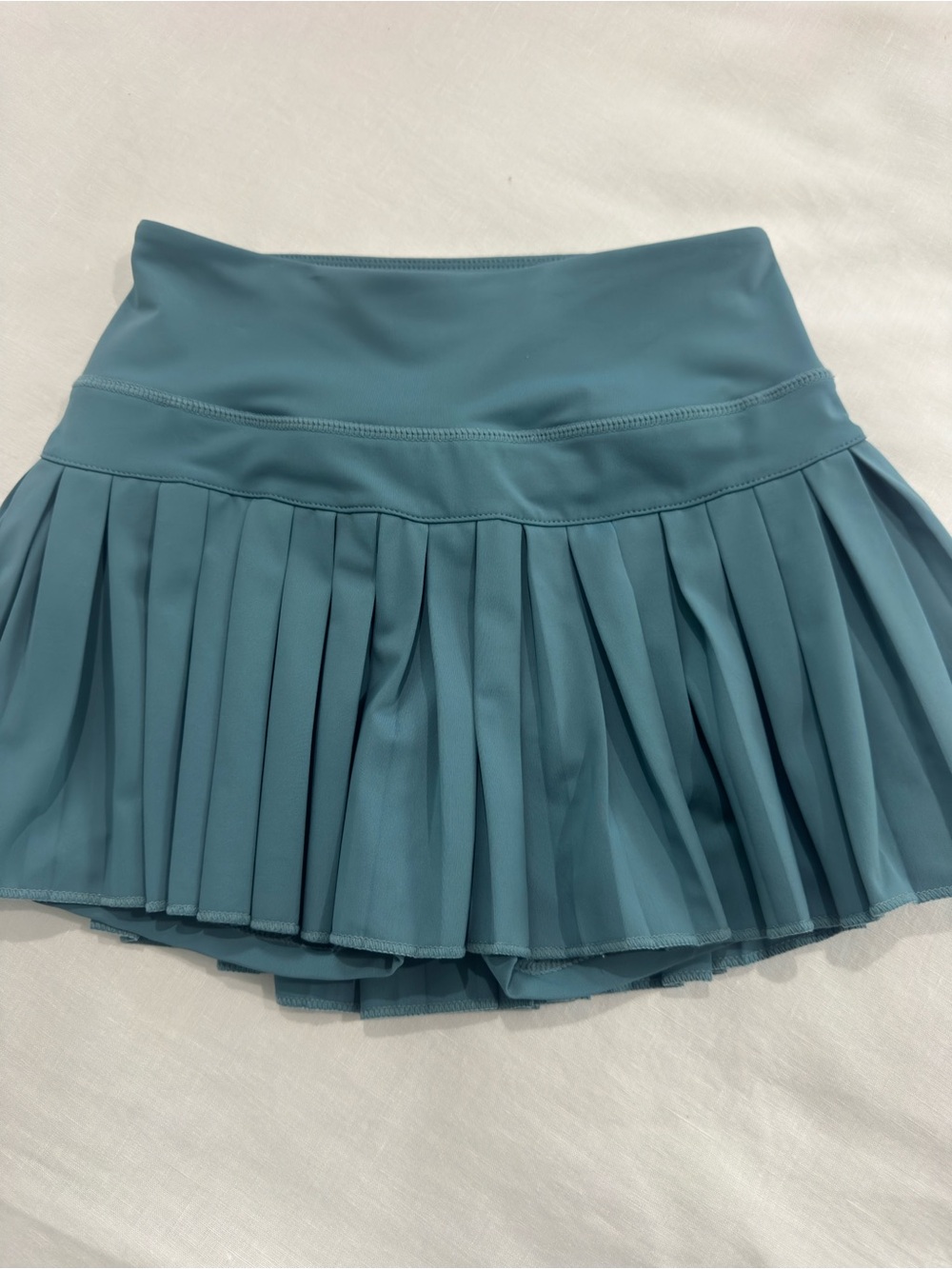 Pleated Mini Skirt with Built-In Shorts in Teal Blue